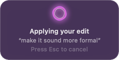 The Quick Edit card with a spinning ring, the text Applying your edit, the instruction make it sound more formal in quotes, and Press Esc to cancel